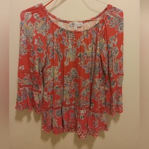 Orange floral blouse